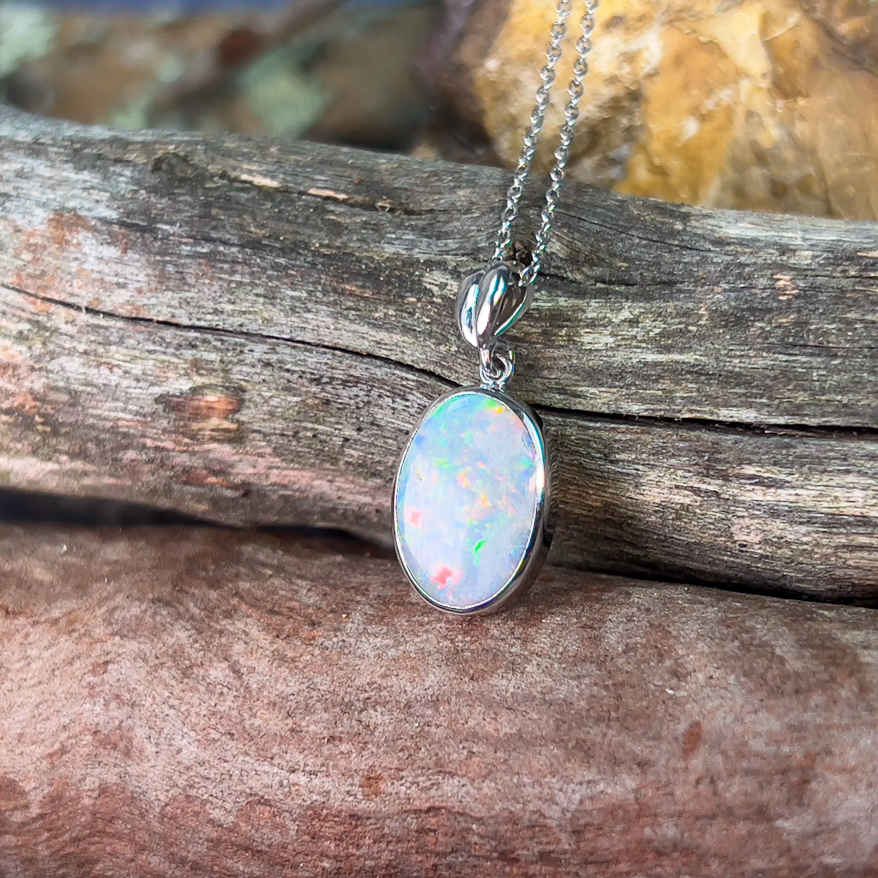 18kt White Gold Semi Black Opal 3.4ct oval pendant