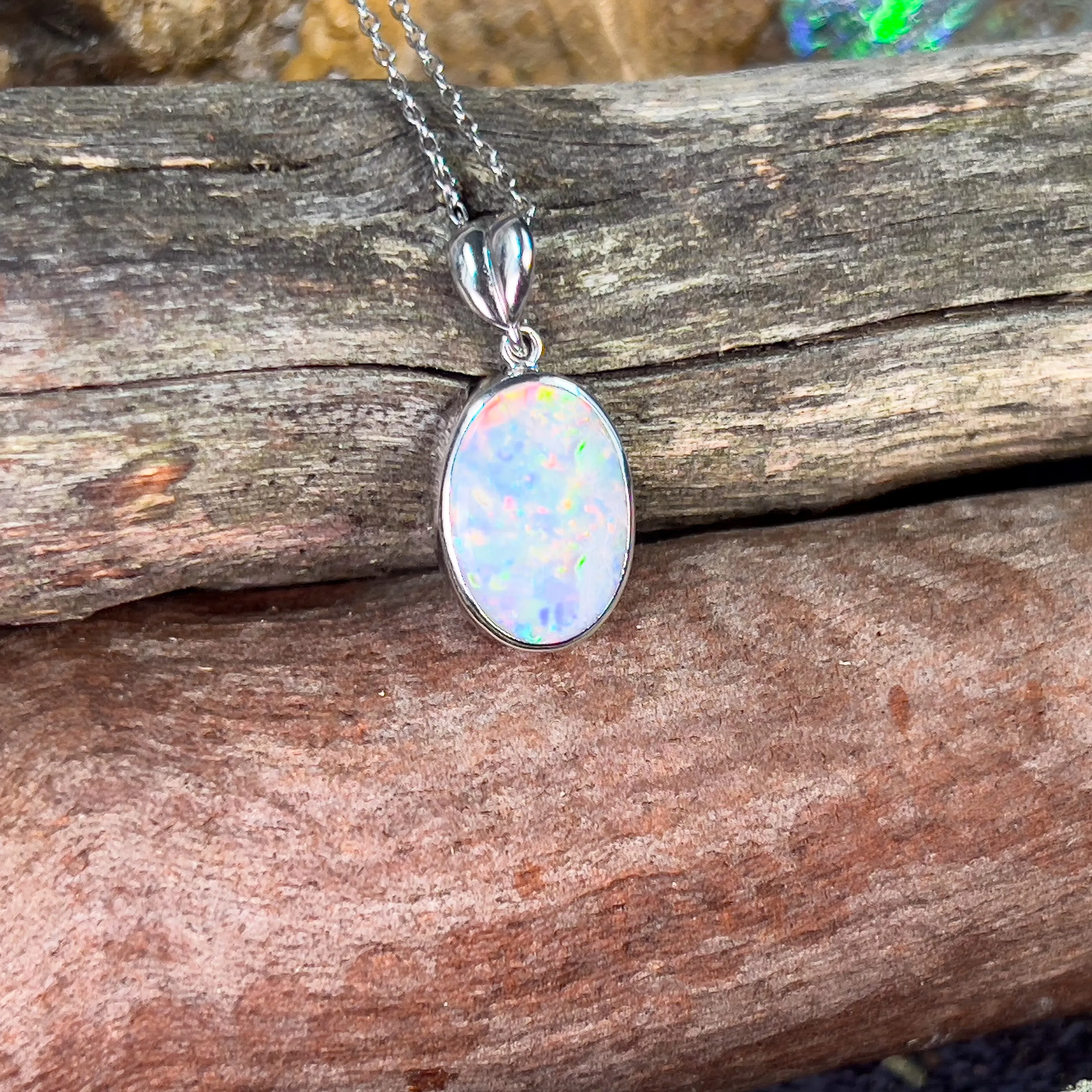 18kt White Gold Semi Black Opal 3.4ct oval pendant