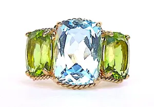 Elegant Three-Stone Ring with Gold Rope Twist Border with Blue Topaz and Peridot