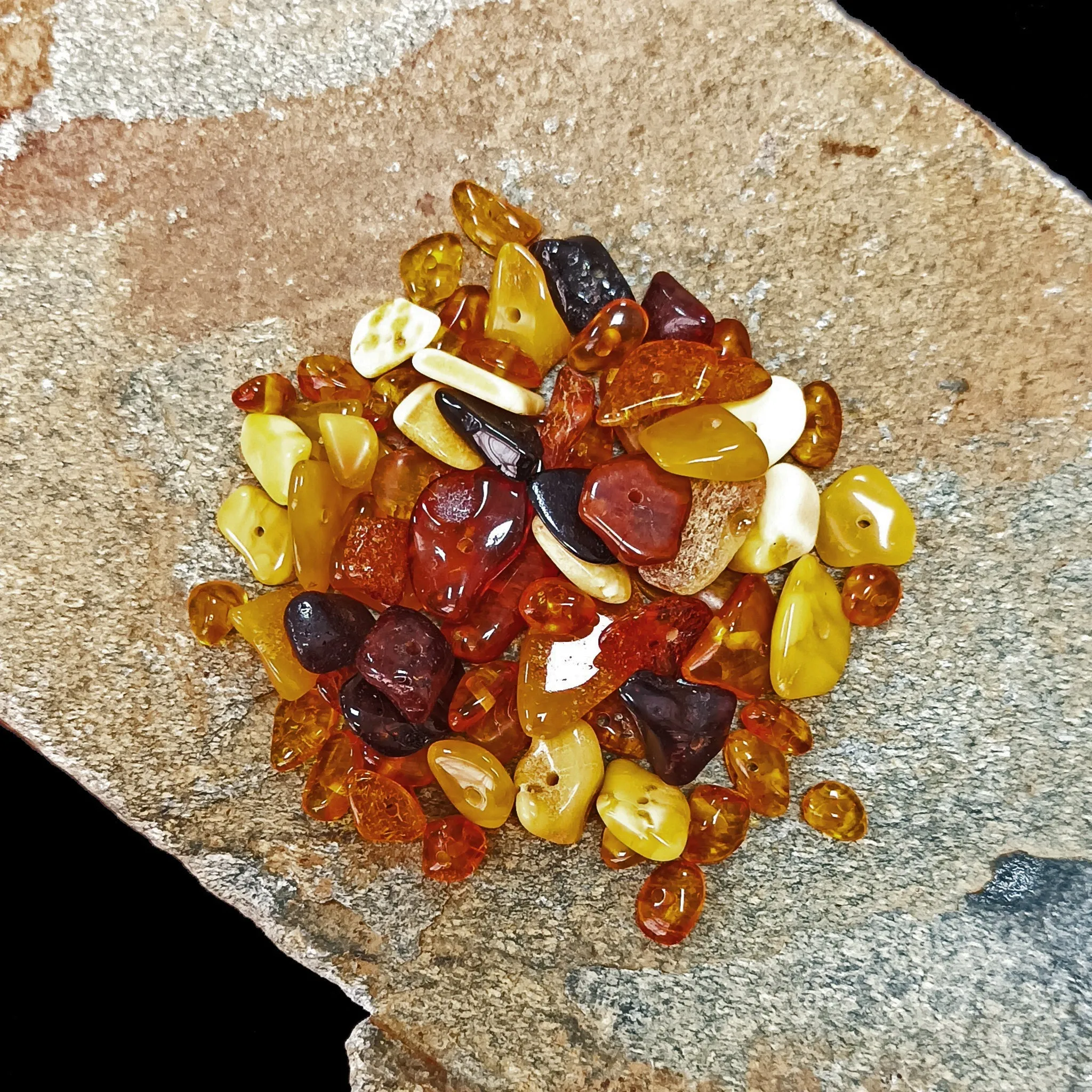 Polished Amber Chips With Drilled Holes